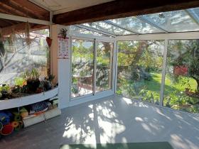 Maison de 190 m2 orientée sud avec vue dégagée sur jardin arboré